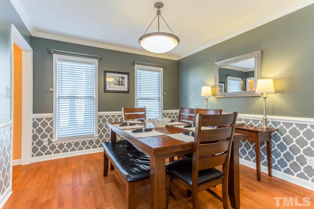 4316 Birmingham Way Raleigh, NC 27604 - Photo 4 of 25 a view of a dining room with furniture window and wooden floor