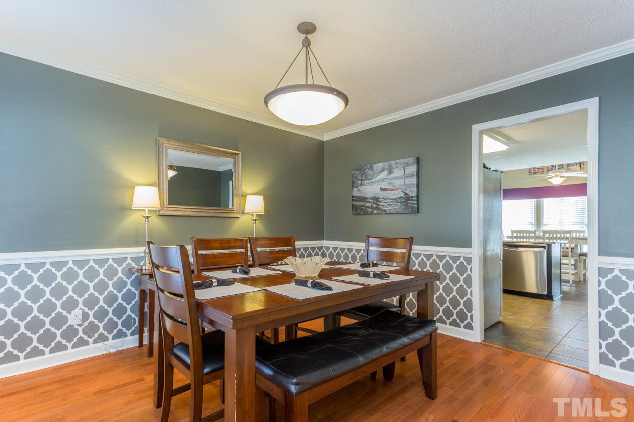 4316 Birmingham Way Raleigh, NC 27604 - Photo 5 of 25 a view of a dining room with furniture