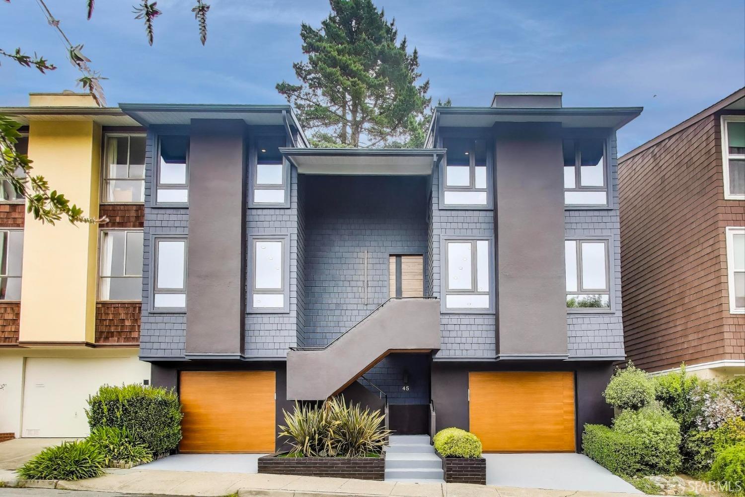 45 Turquoise Way San Francisco, CA 94131 - Photo 1 of 87 a front view of a house with a yard