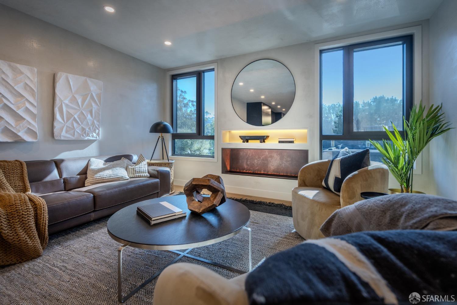 45 Turquoise Way San Francisco, CA 94131 - Photo 3 of 87 a living room with furniture and a large mirror