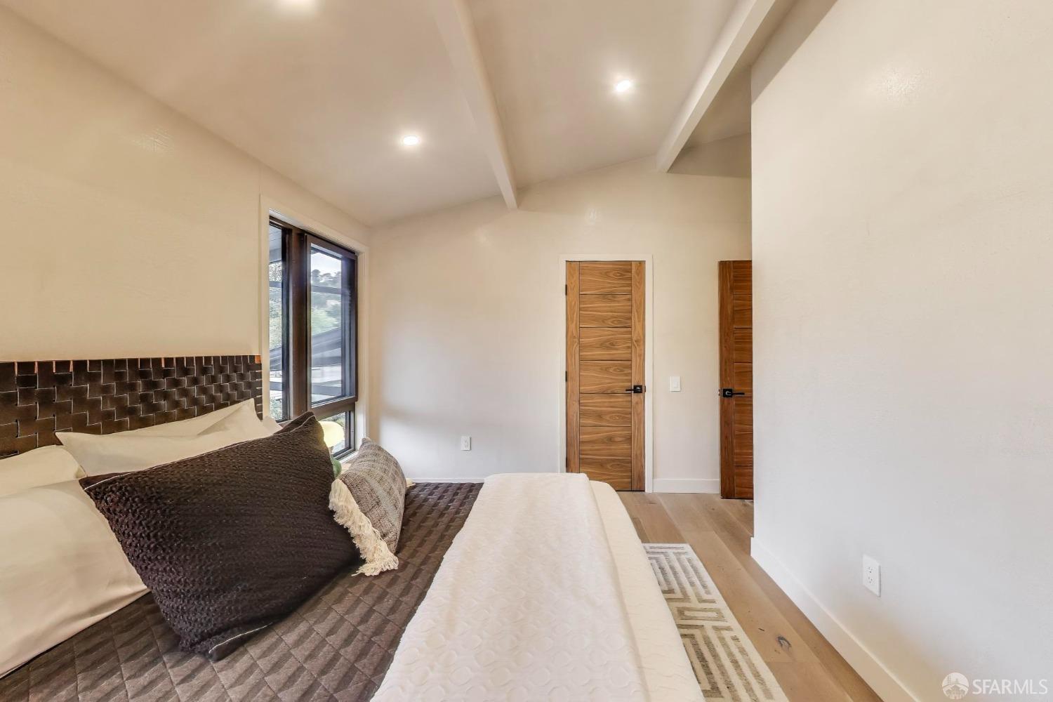 45 Turquoise Way San Francisco, CA 94131 - Photo 43 of 87 a bed room with a bed and a night stand