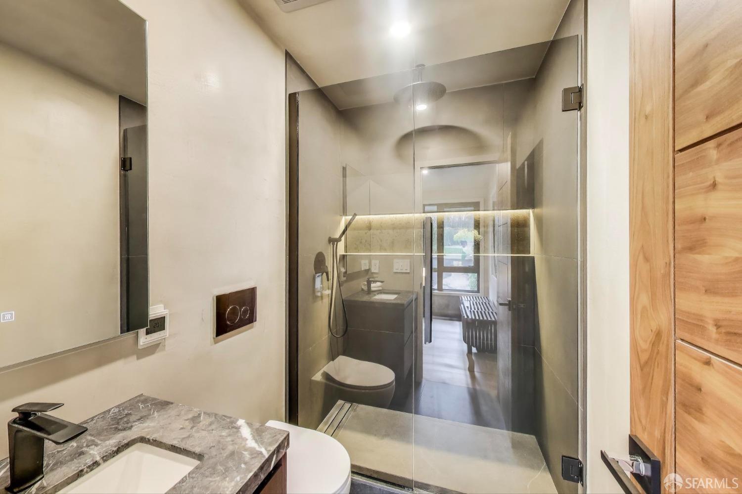 45 Turquoise Way San Francisco, CA 94131 - Photo 45 of 87 a bathroom with a sink toilet and shower