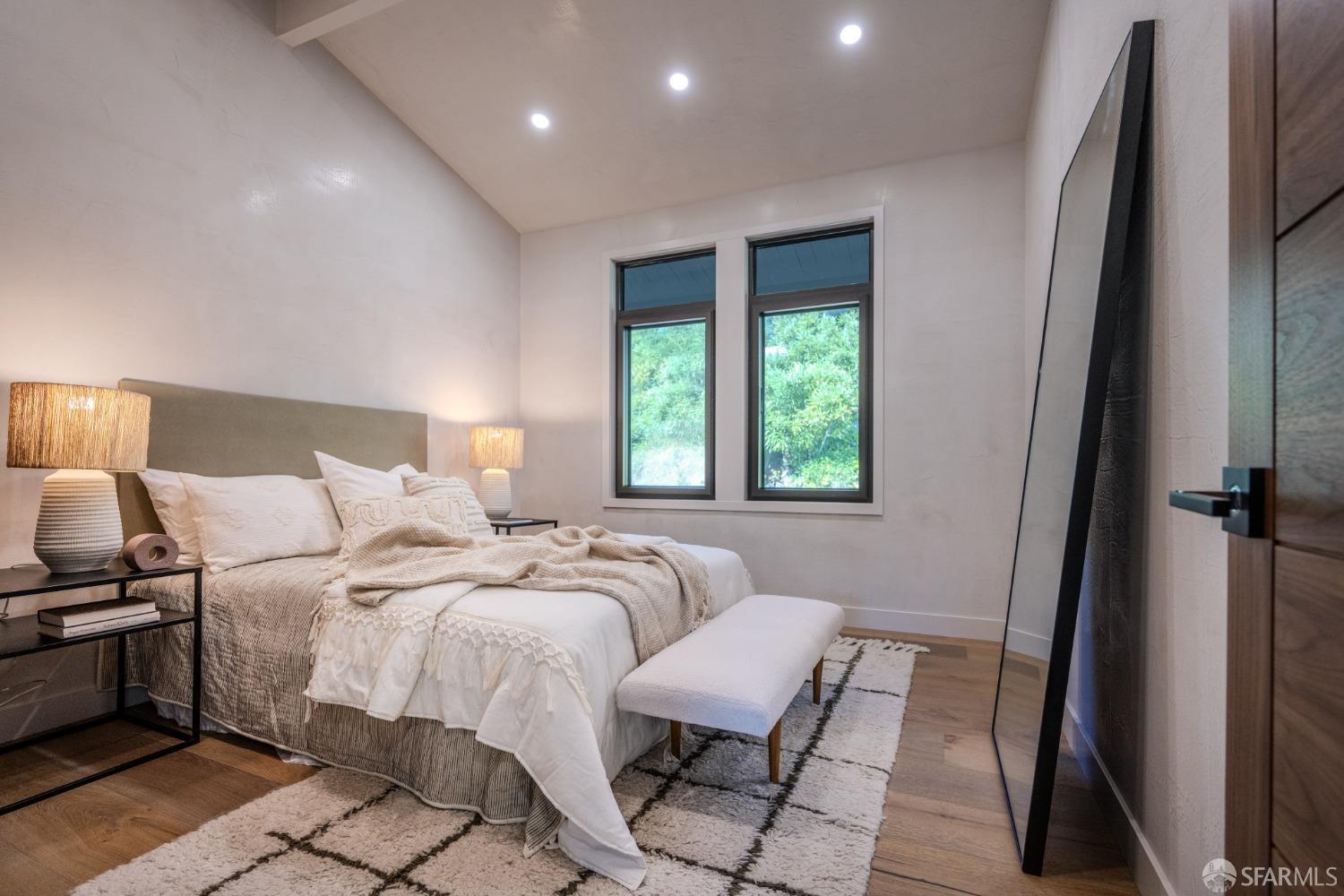 45 Turquoise Way San Francisco, CA 94131 - Photo 52 of 87 a bedroom with a bed and a window