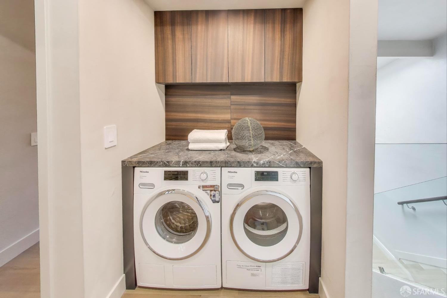 45 Turquoise Way San Francisco, CA 94131 - Photo 56 of 87 a utility room with dryer and washer
