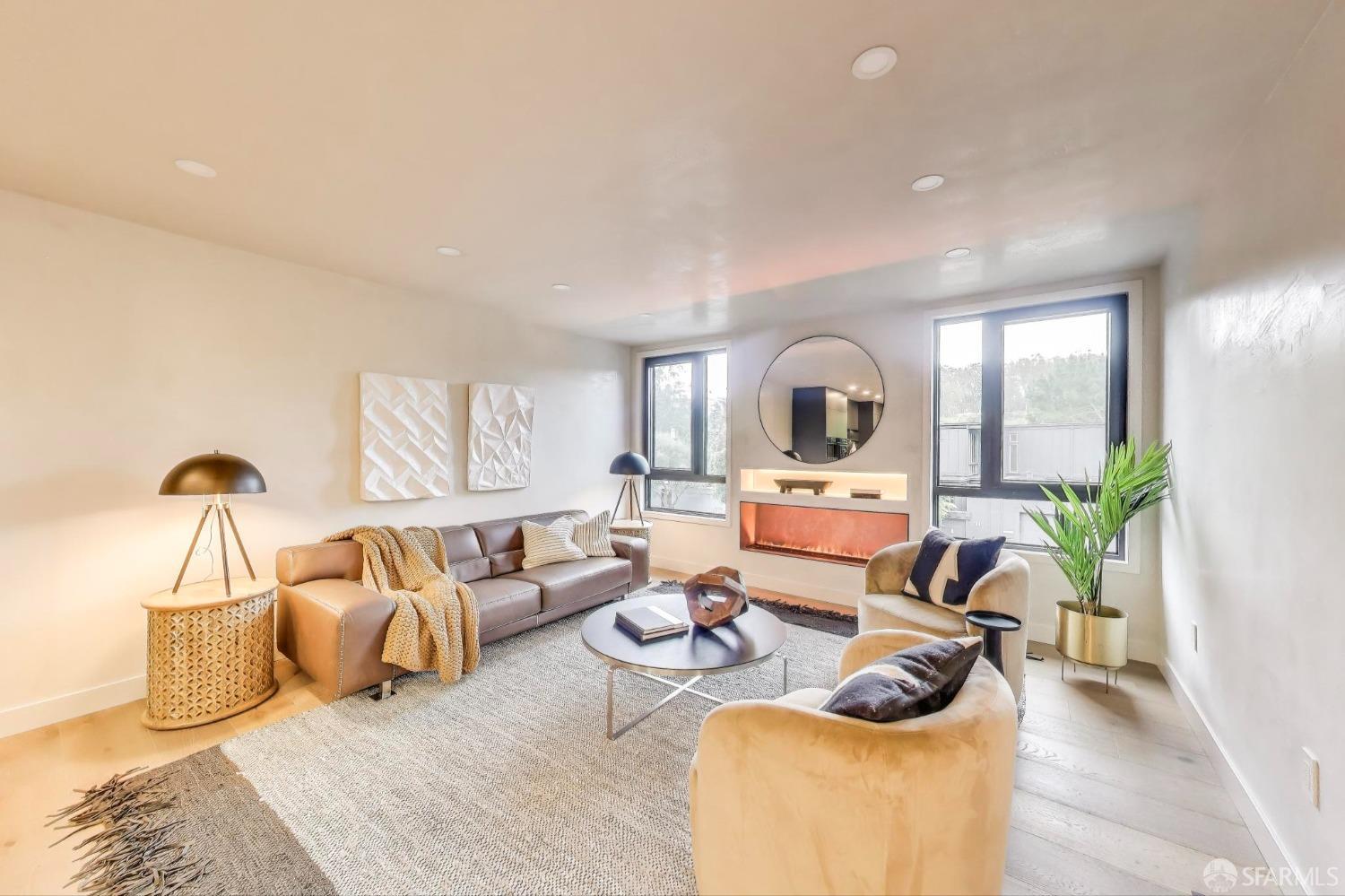 45 Turquoise Way San Francisco, CA 94131 - Photo 6 of 87 a living room with furniture and a large window