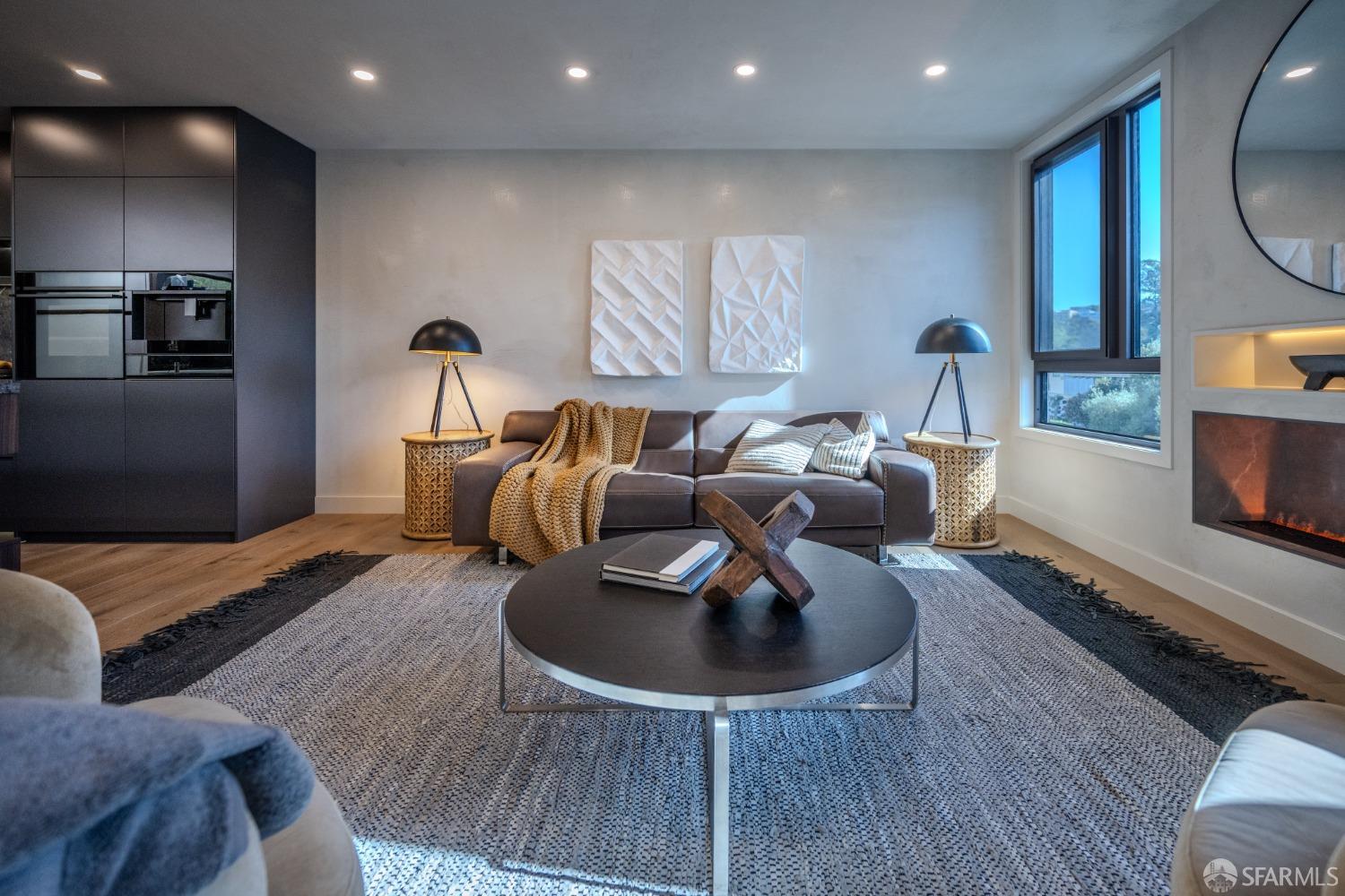 45 Turquoise Way San Francisco, CA 94131 - Photo 7 of 87 a living room with furniture and a flat screen tv