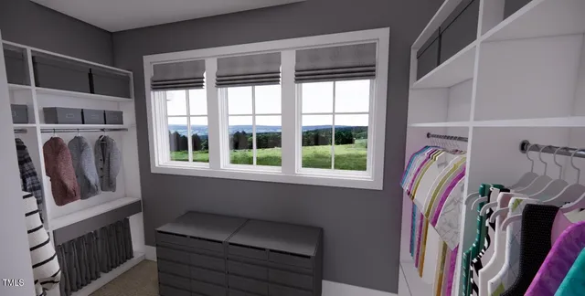 a view of a hallway with wooden floor and dining room