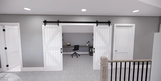 a workspace with furniture and window