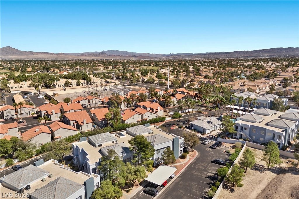 2201 Ramsgate Drive, Unit 818 Henderson, NV 89074 - Photo 30 of 32 Aerial perspective of suburban area featuring mountains
