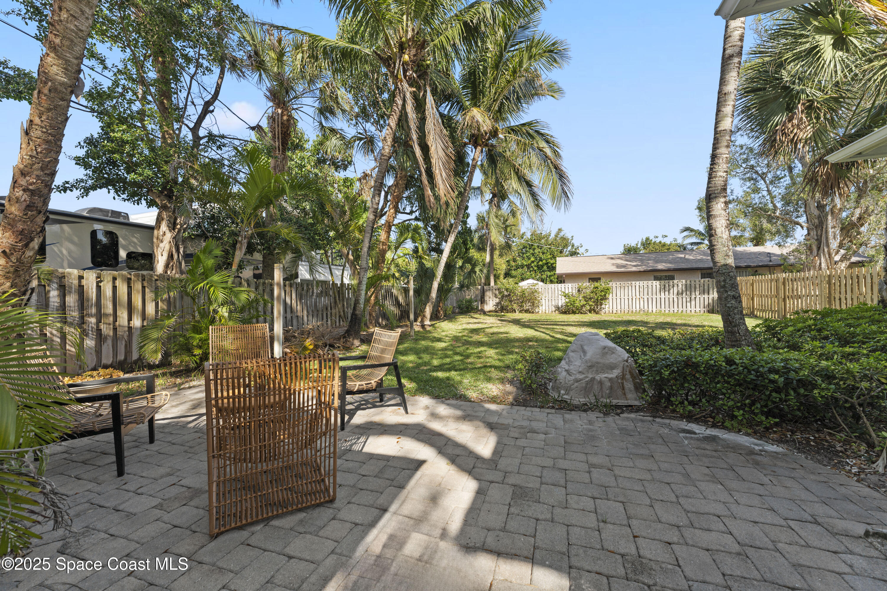 346 3rd Avenue Indialantic, FL 32903 - Photo 11 of 47 a view of a backyard with sitting area