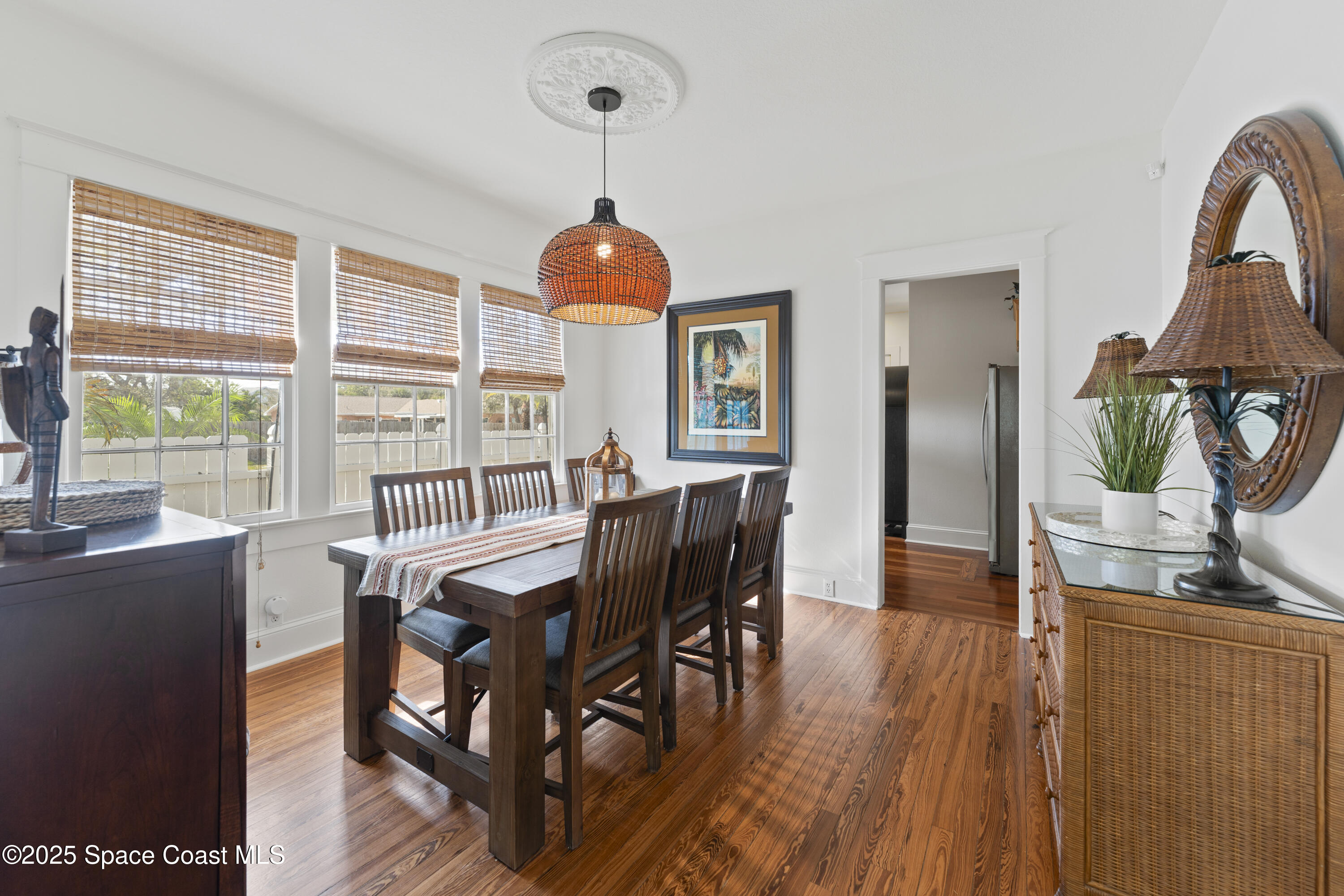 346 3rd Avenue Indialantic, FL 32903 - Photo 15 of 47 a view of a dining room with furniture window and wooden floor