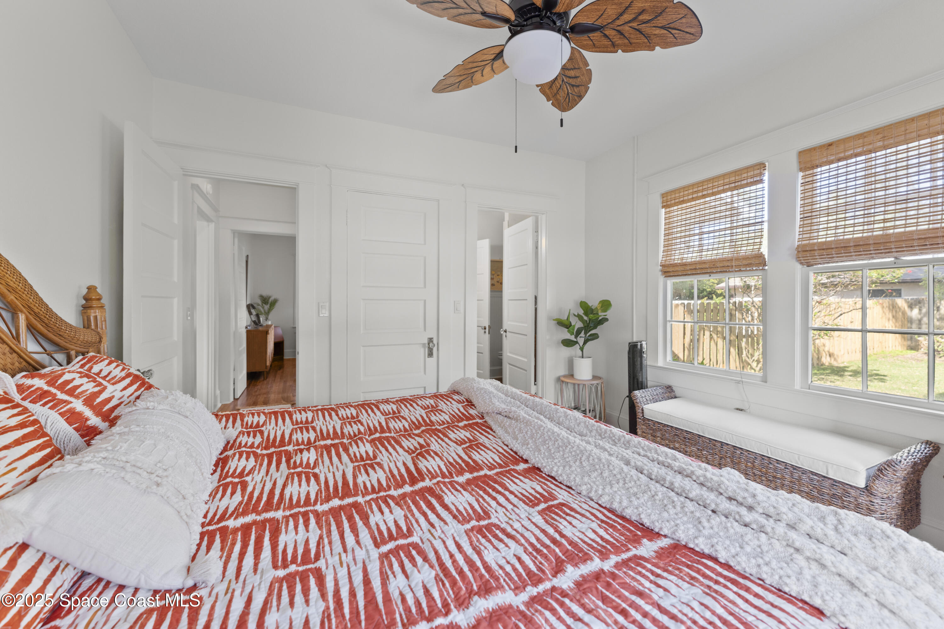 346 3rd Avenue Indialantic, FL 32903 - Photo 21 of 47 a bedroom with a bed and wooden floor