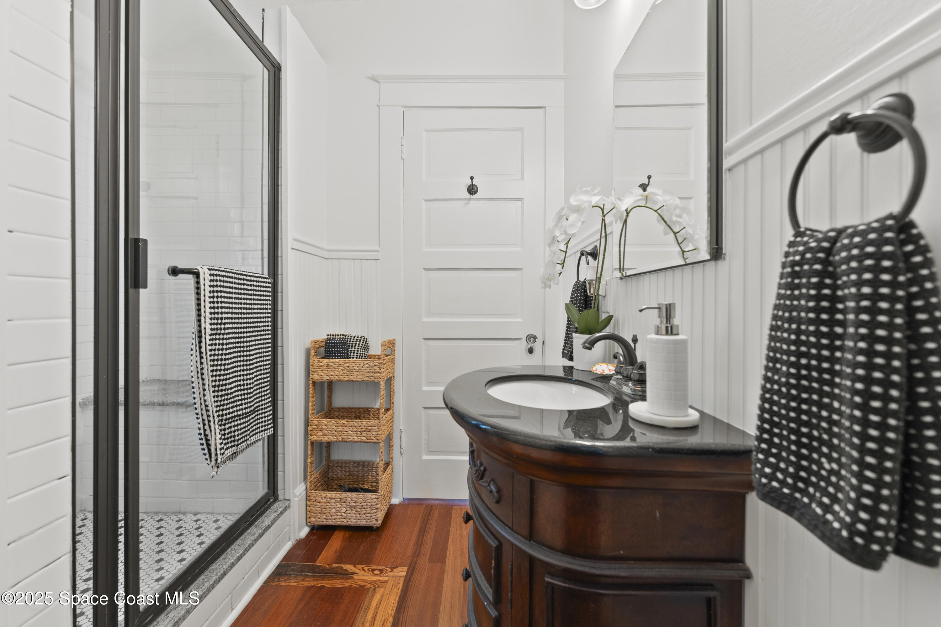 346 3rd Avenue Indialantic, FL 32903 - Photo 25 of 47 a bathroom with a sink and a mirror