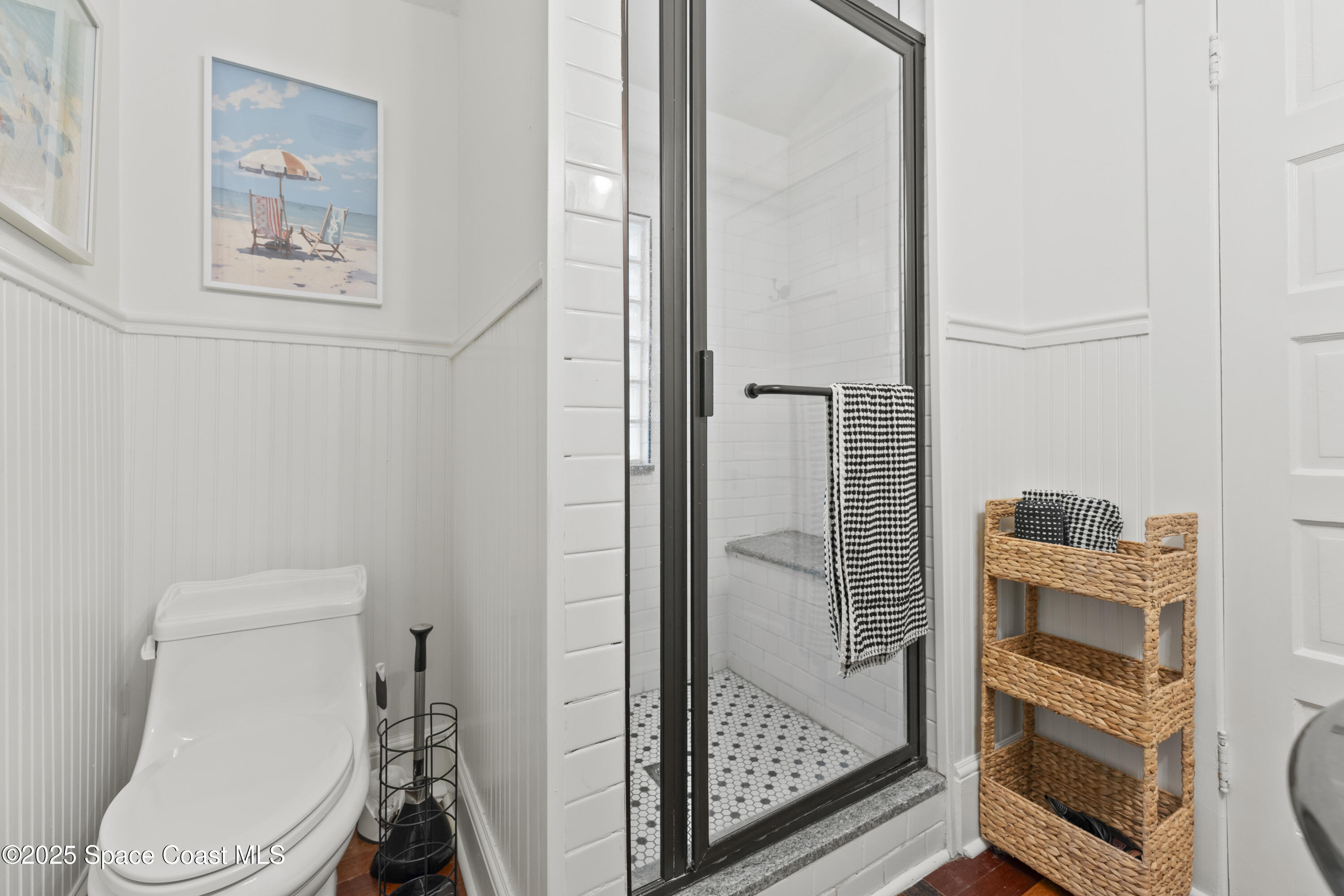 346 3rd Avenue Indialantic, FL 32903 - Photo 26 of 47 a bathroom with a toilet and a shower