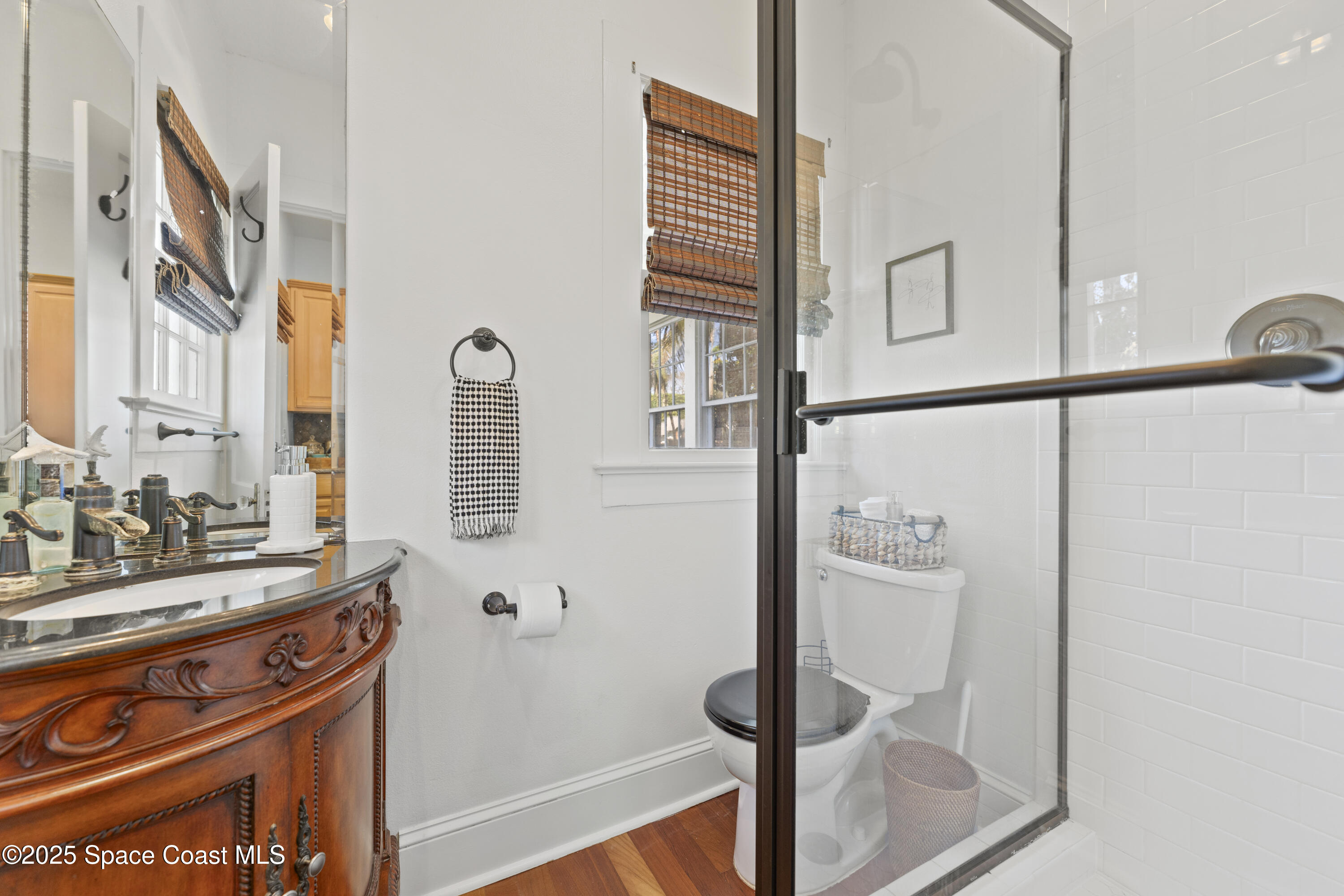 346 3rd Avenue Indialantic, FL 32903 - Photo 27 of 47 a bathroom with a sink and a mirror