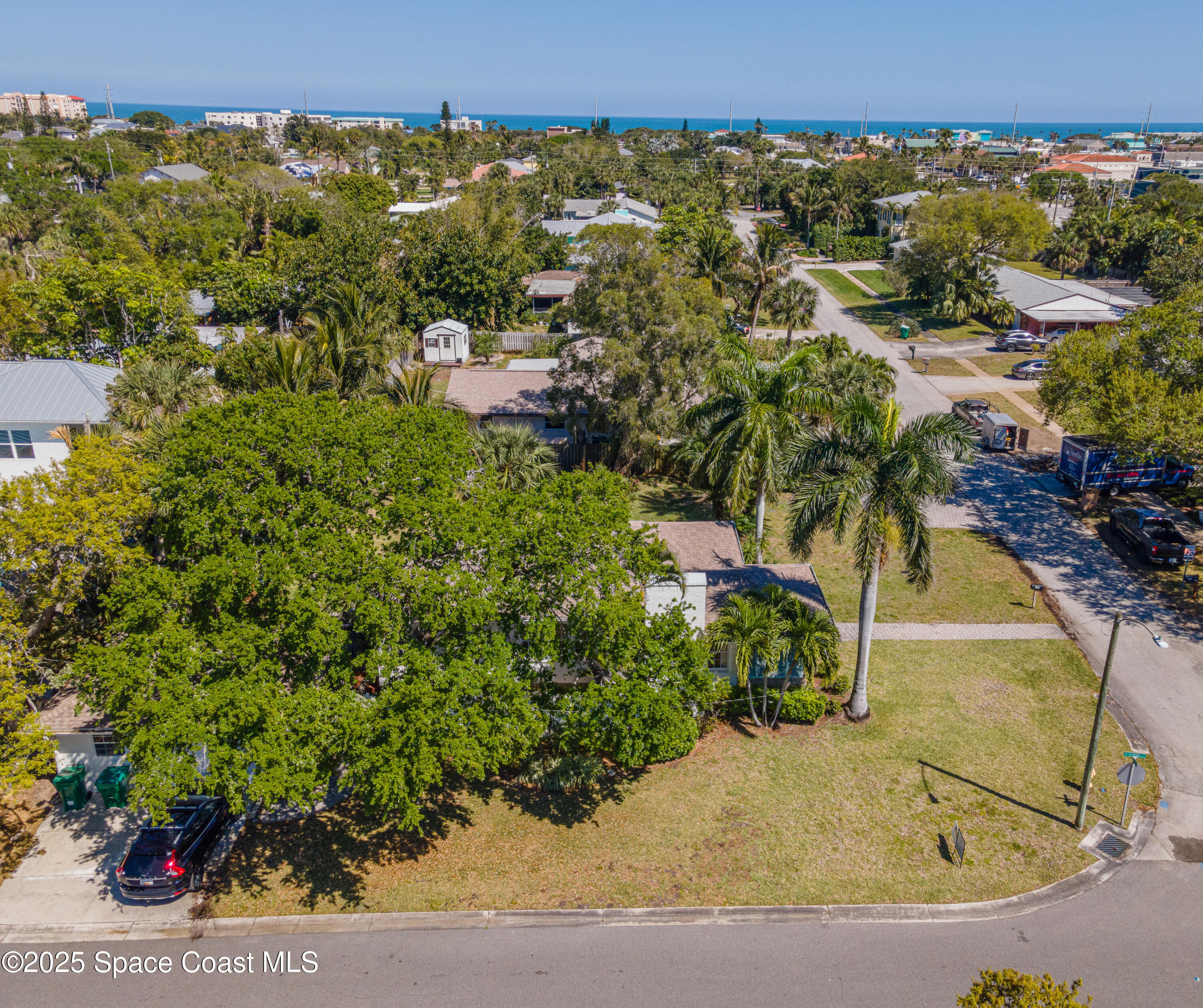346 3rd Avenue Indialantic, FL 32903 - Photo 3 of 47 an aerial view of a house with a yard