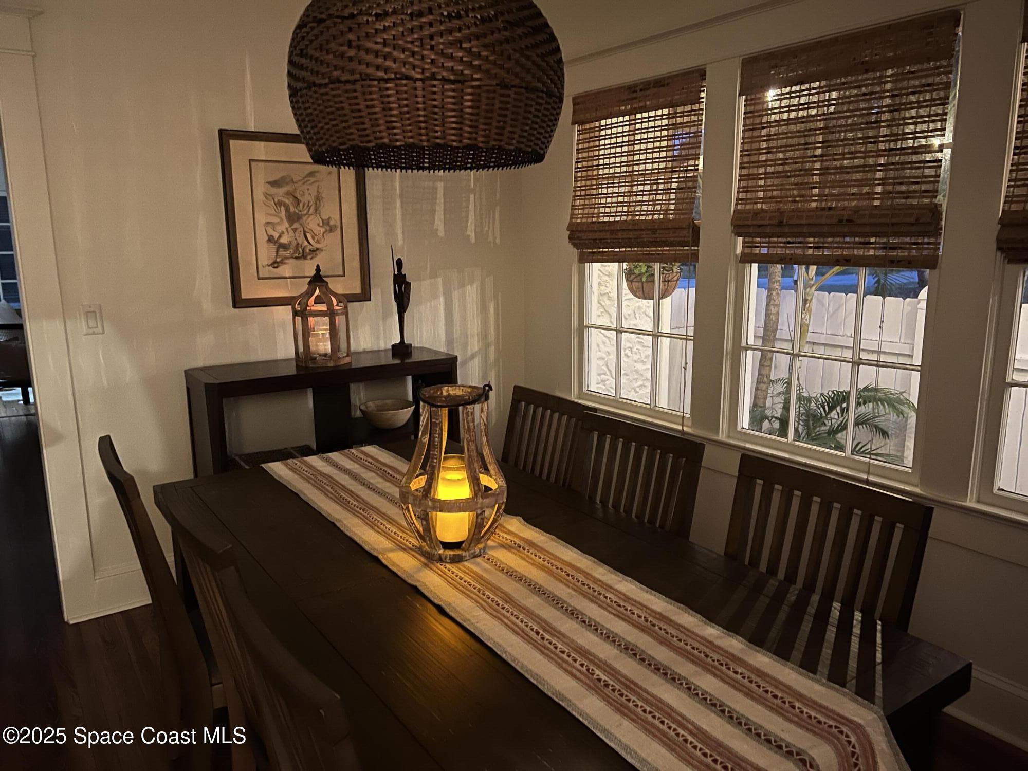 346 3rd Avenue Indialantic, FL 32903 - Photo 35 of 47 a view of a dining room with furniture window and wooden floor