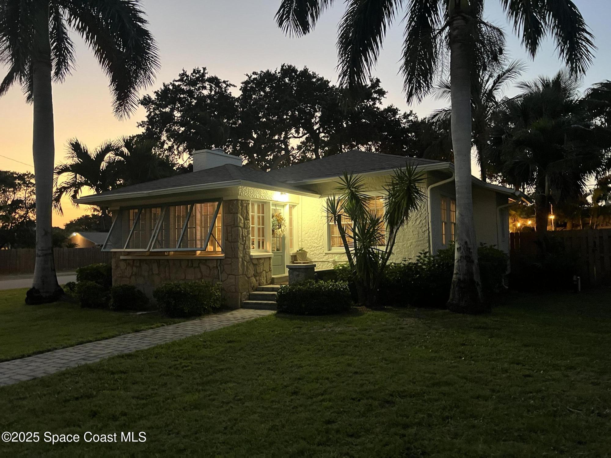 346 3rd Avenue Indialantic, FL 32903 - Photo 39 of 47 a view of house with backyard space and garden