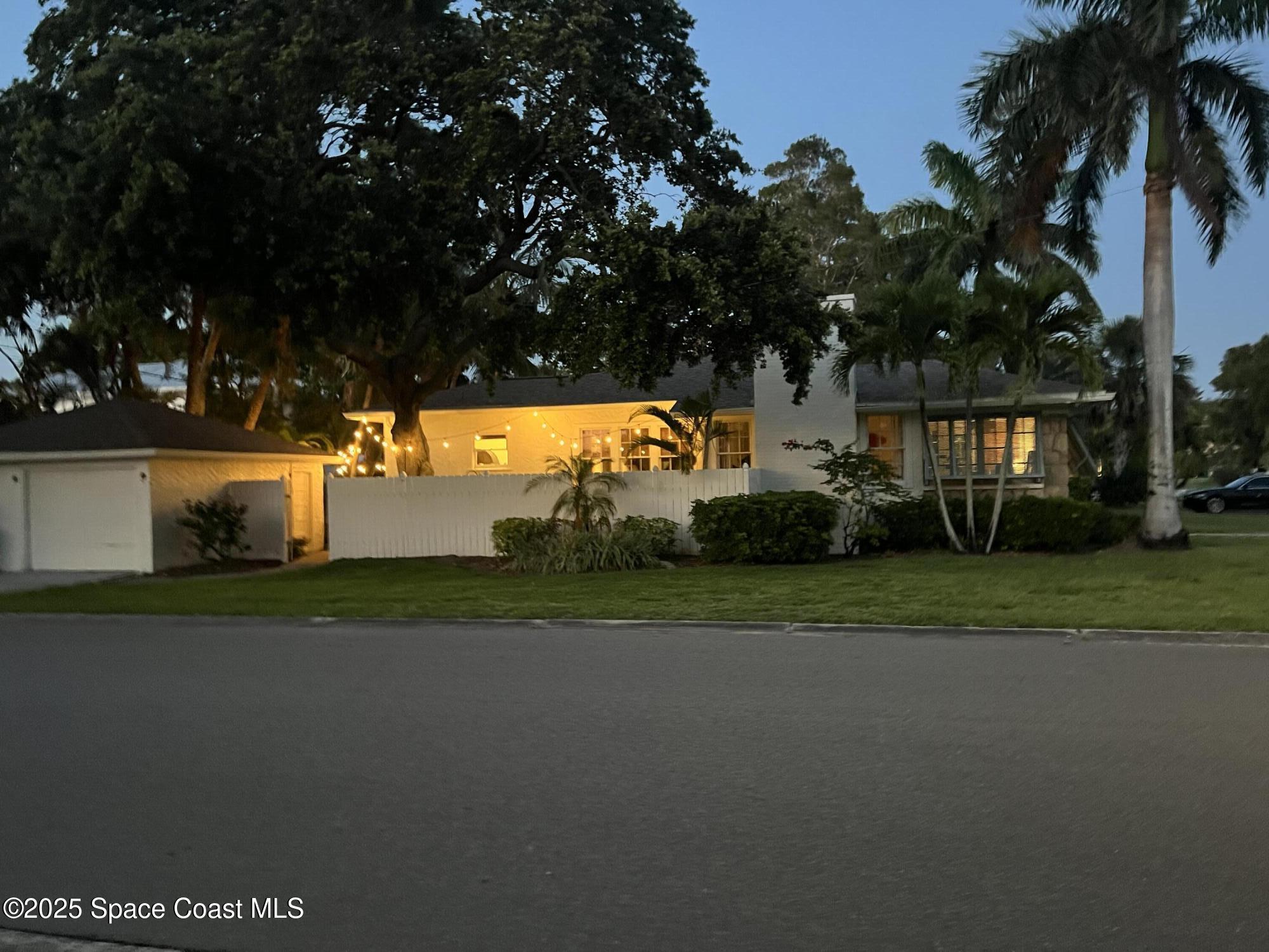 346 3rd Avenue Indialantic, FL 32903 - Photo 44 of 47 a house view with a garden space