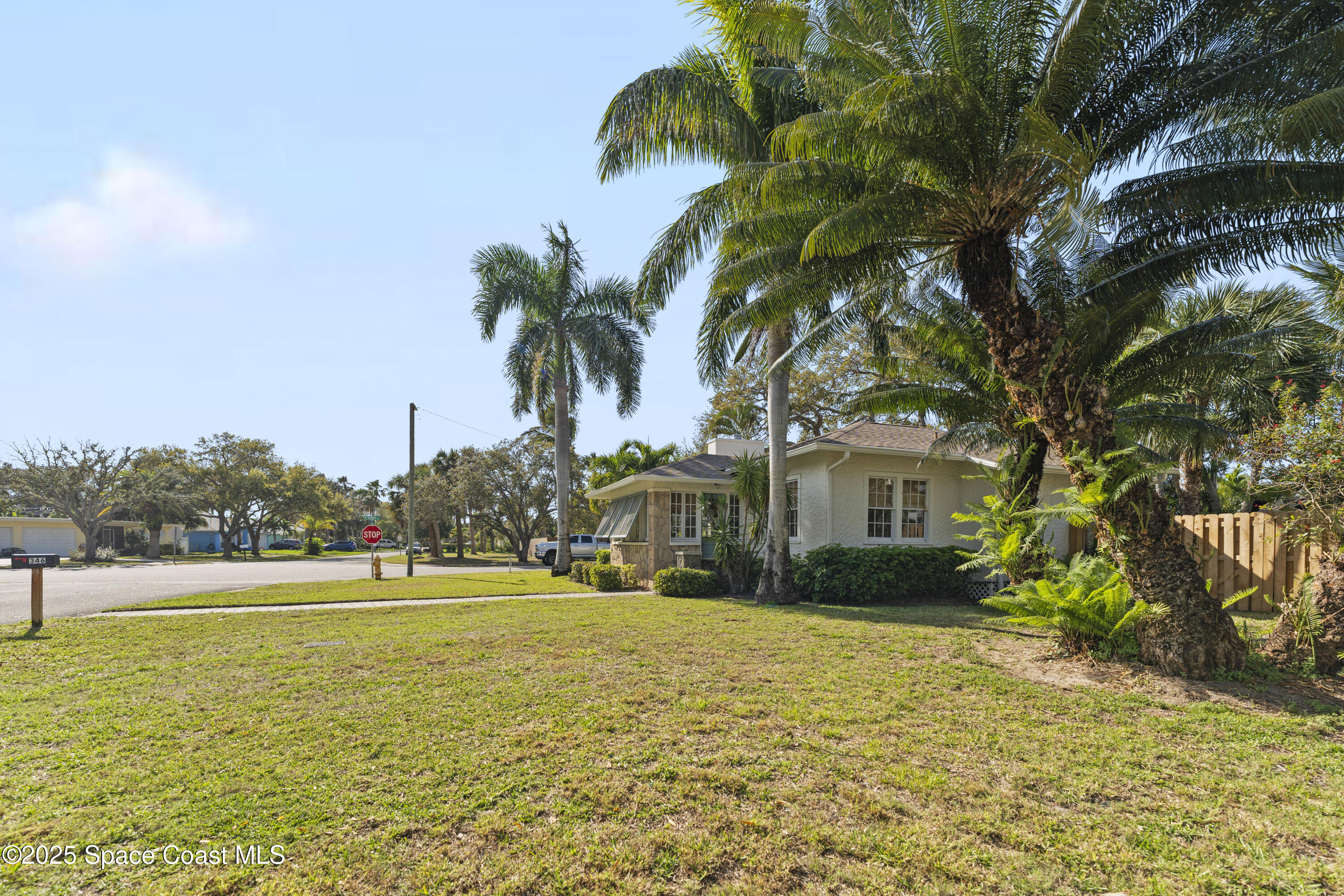 346 3rd Avenue Indialantic, FL 32903 - Photo 6 of 47 a front view of house with yard and green space