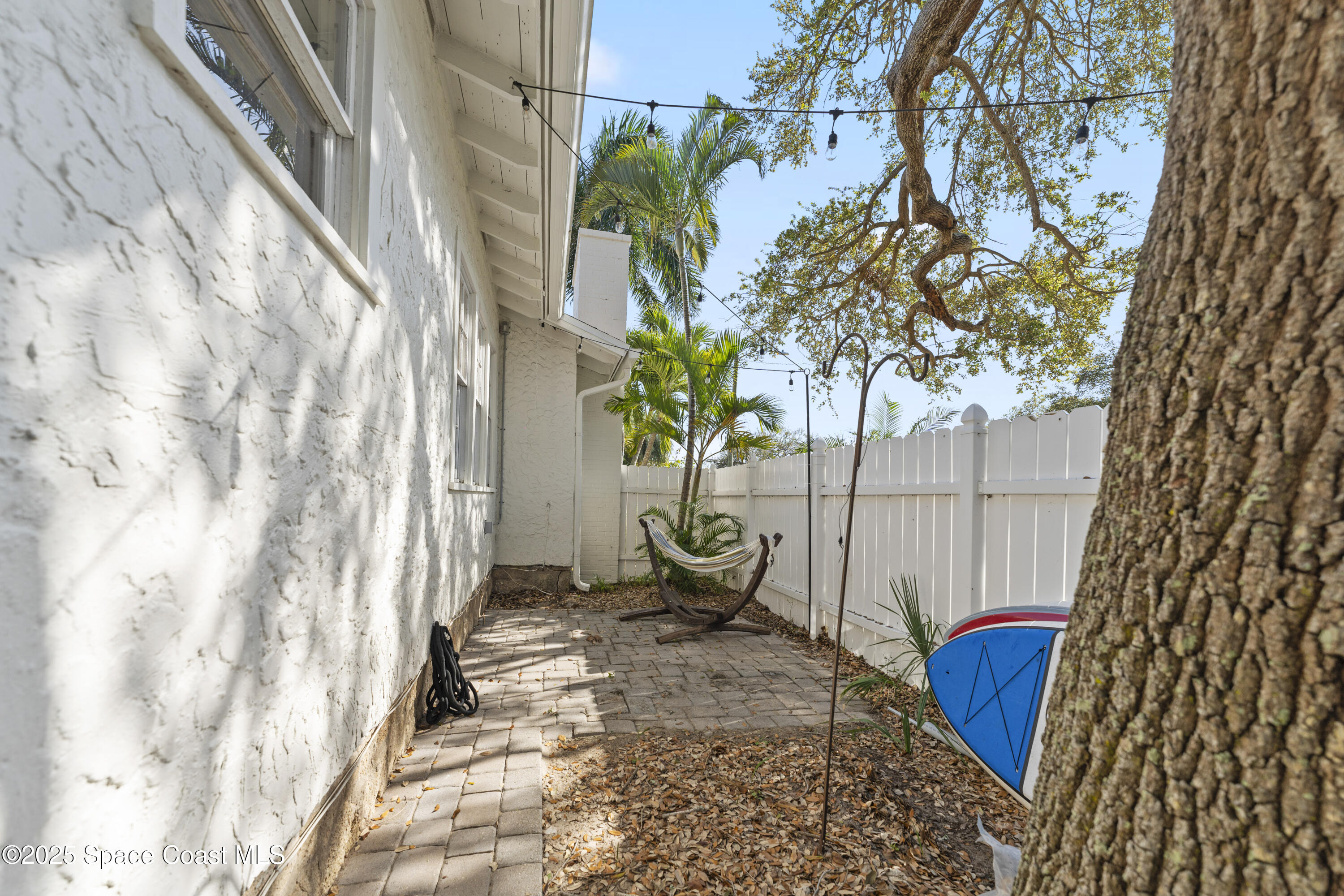 346 3rd Avenue Indialantic, FL 32903 - Photo 10 of 47 a view of a house with a potted plant