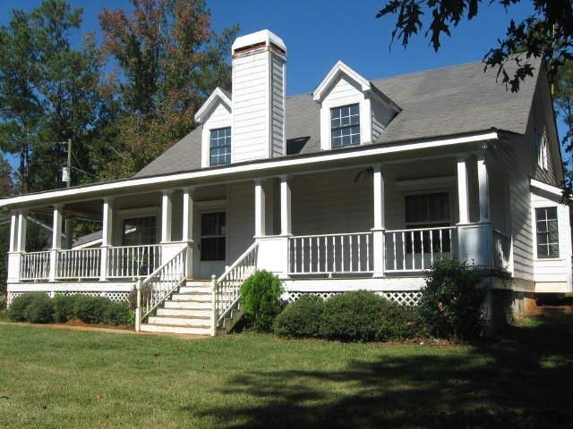 899 Garner Road Gay, GA 30218 - Photo 1 of 1 a house view with a garden space