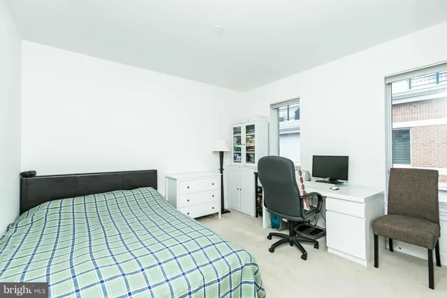 a kitchen with a sink and a window
