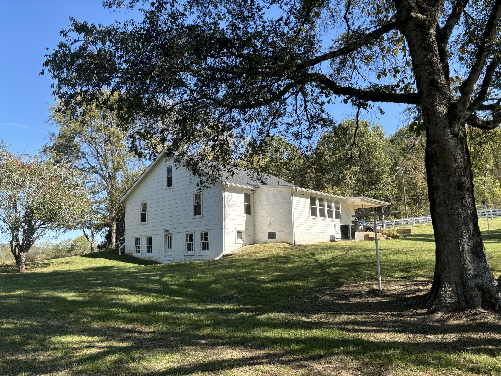 1893 Briar Patch Road Prospect, TN 38477 - Photo 14 of 43 a white house that has tree in front of it