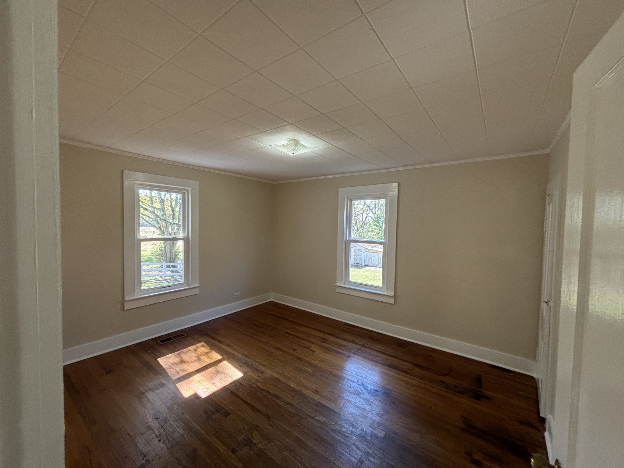 1893 Briar Patch Road Prospect, TN 38477 - Photo 19 of 43 a view of empty room with window and wooden floor