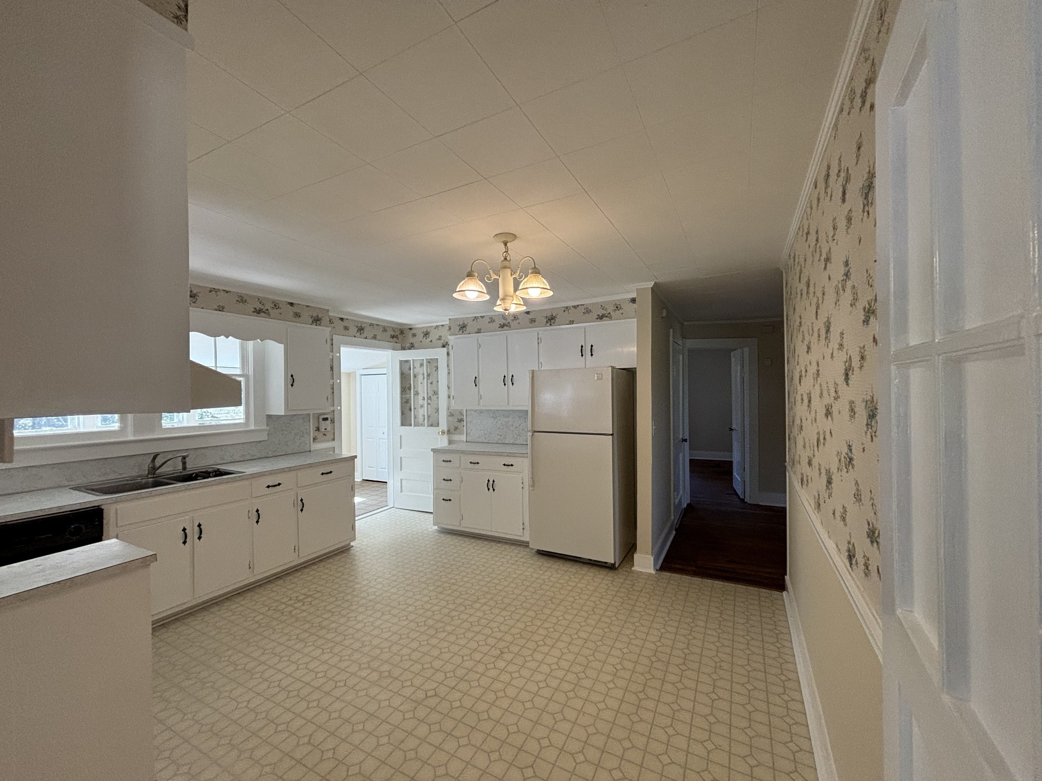 1893 Briar Patch Road Prospect, TN 38477 - Photo 23 of 43 a large white kitchen with a stove and a refrigerator