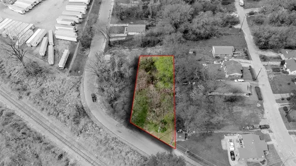 a view of a balcony with wooden floor