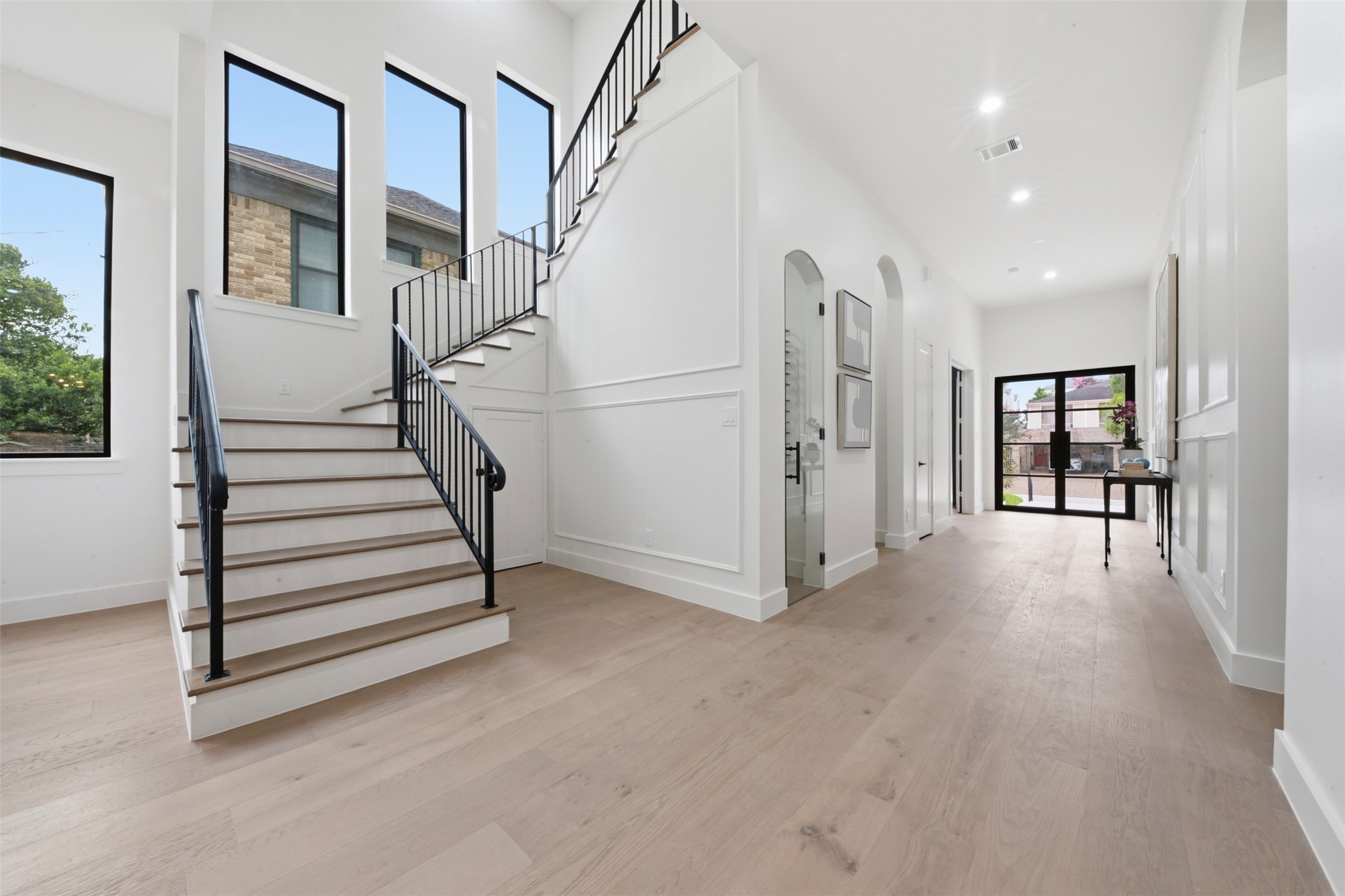 2325 Wroxton Road Houston, TX 77005 - Photo 4 of 31 Spacious entrance walkway with wine room and grand staircase