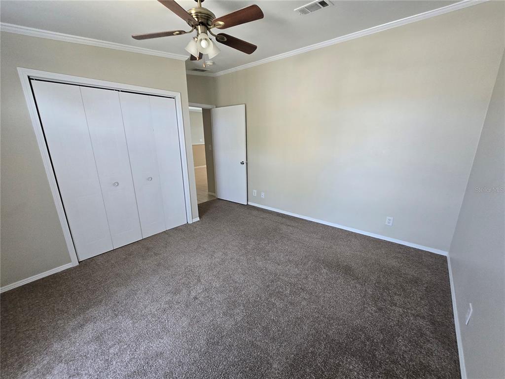 7644 Sailwinds Pass Port Richey, FL 34668 - Photo 19 of 22 a view of an empty room