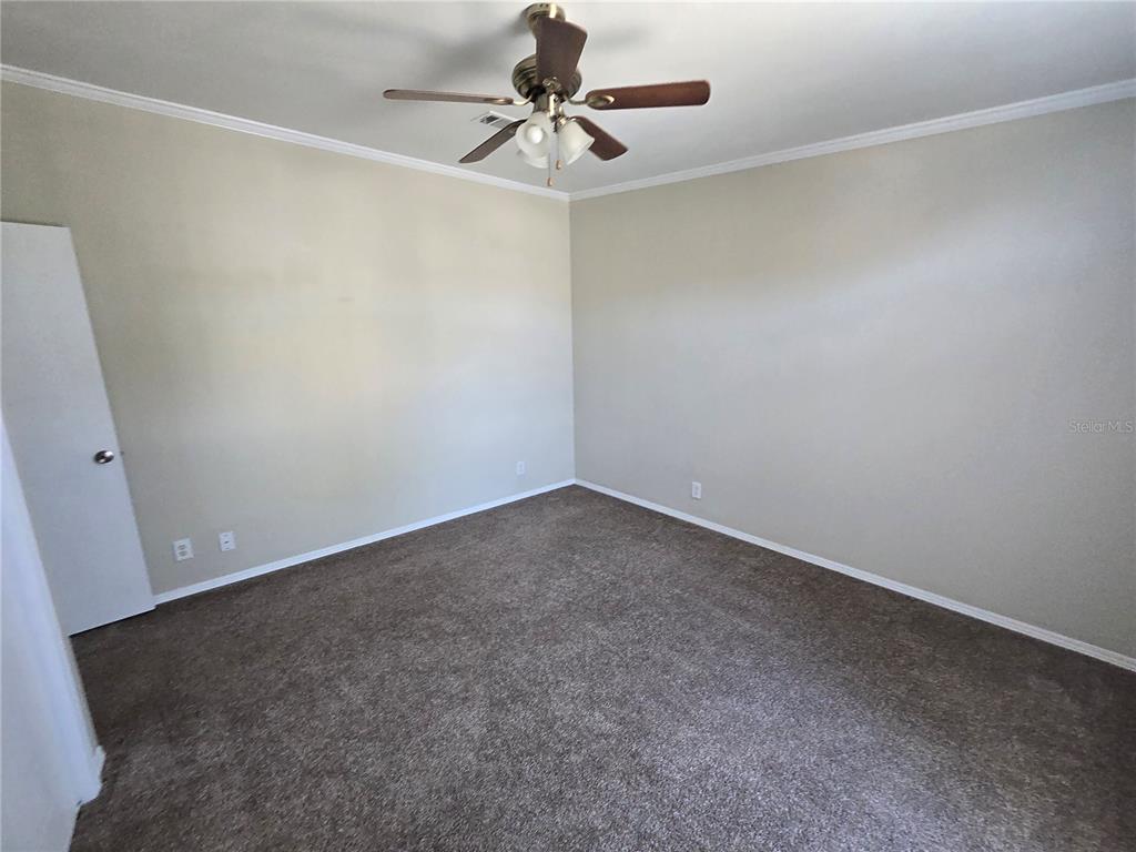 7644 Sailwinds Pass Port Richey, FL 34668 - Photo 20 of 22 a view of an empty room