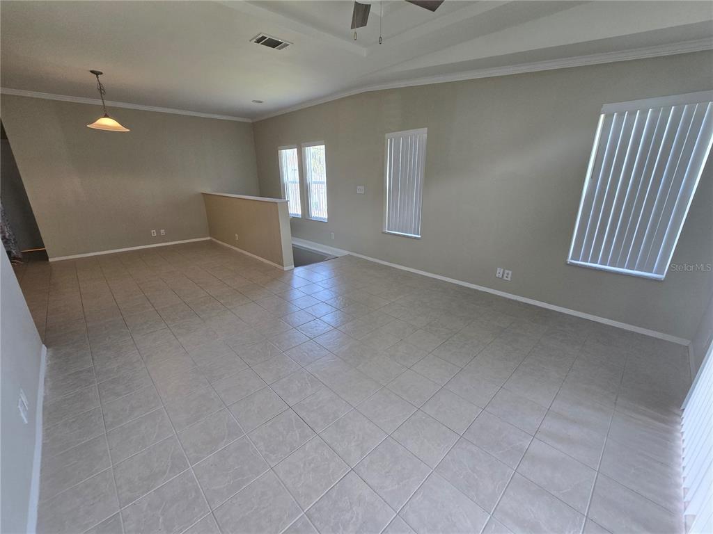 7644 Sailwinds Pass Port Richey, FL 34668 - Photo 3 of 22 an empty room with windows