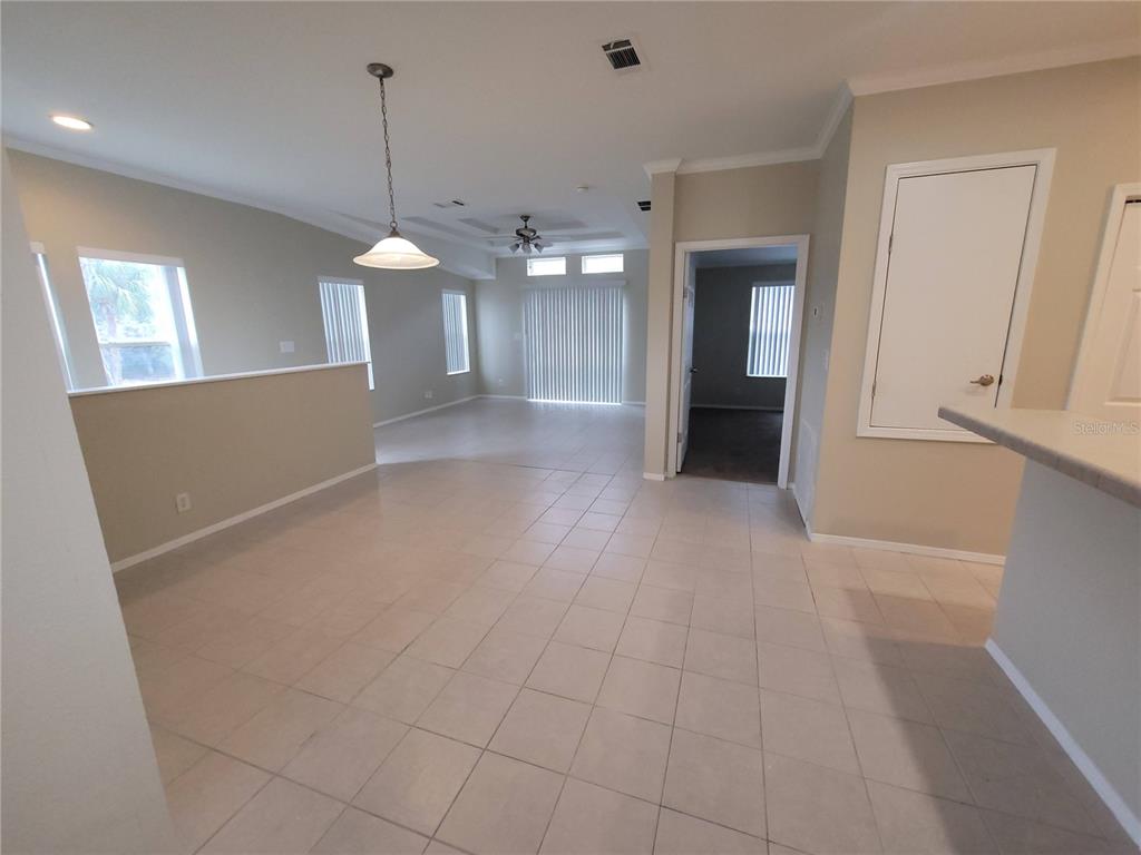 7644 Sailwinds Pass Port Richey, FL 34668 - Photo 7 of 22 a view of a windows and chandelier in a room