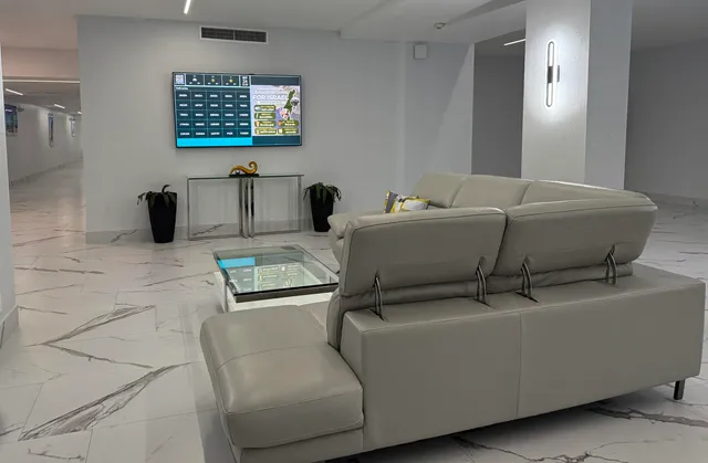 a living room with furniture and a table