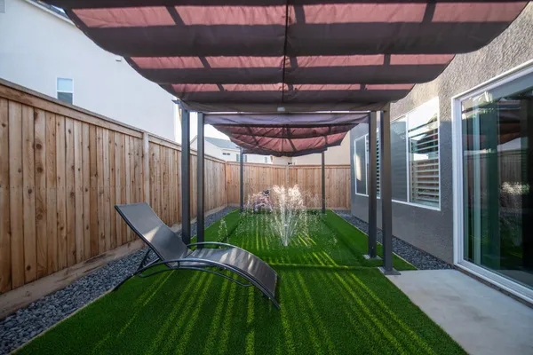 a view of a backyard with plants