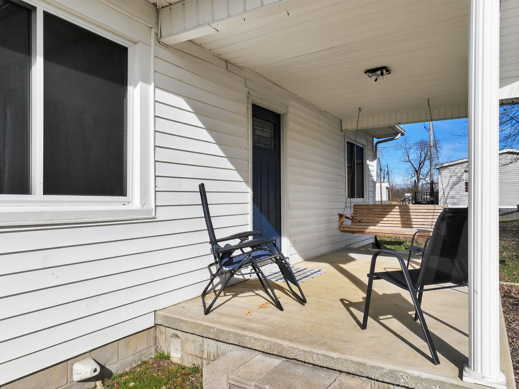 1360 Dunavin Drive Baxter, TN 38544 - Photo 18 of 24 a view of a patio with table and chairs and potted plants