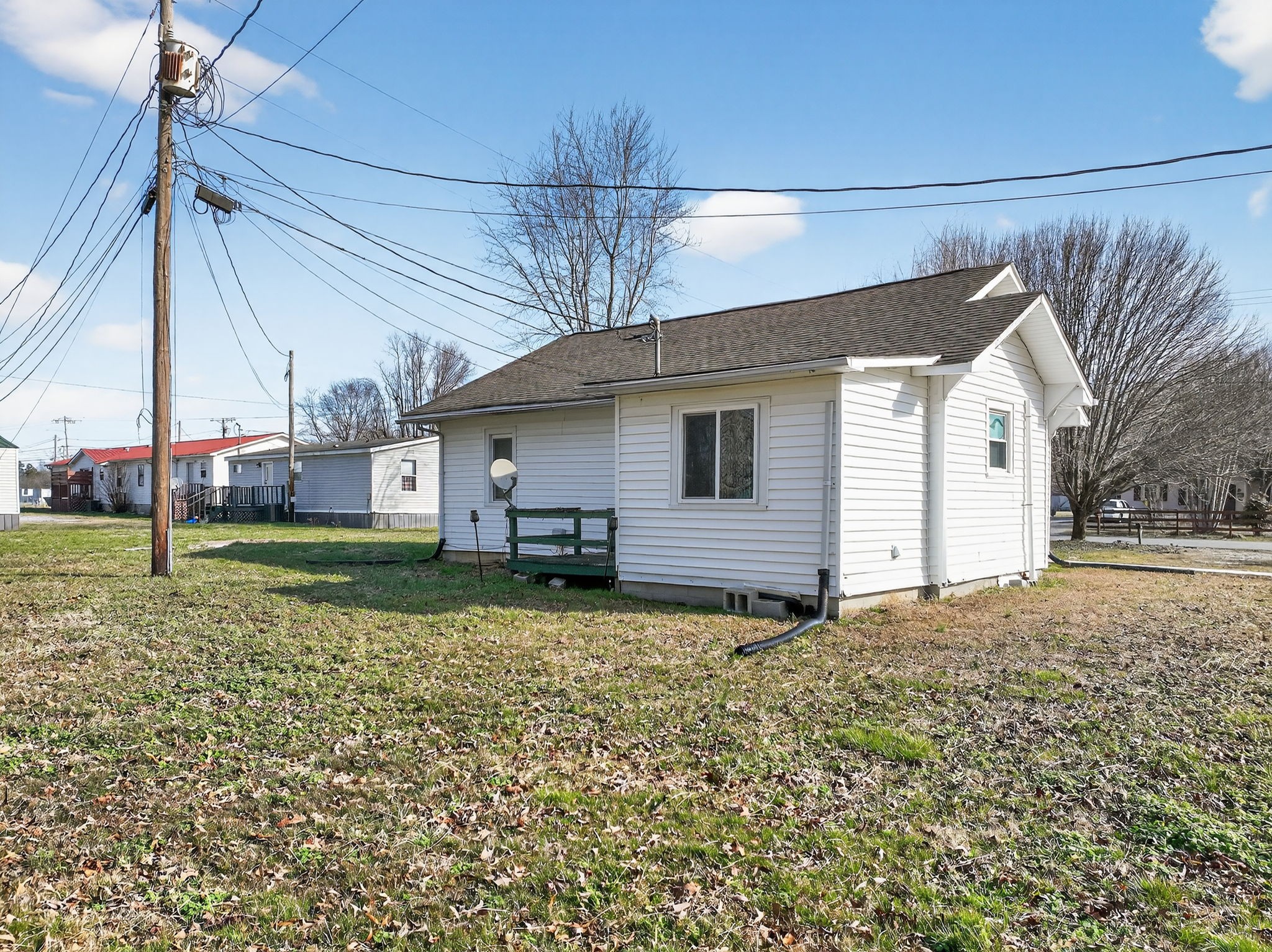 1360 Dunavin Drive Baxter, TN 38544 - Photo 20 of 24 a view of a house with a yard