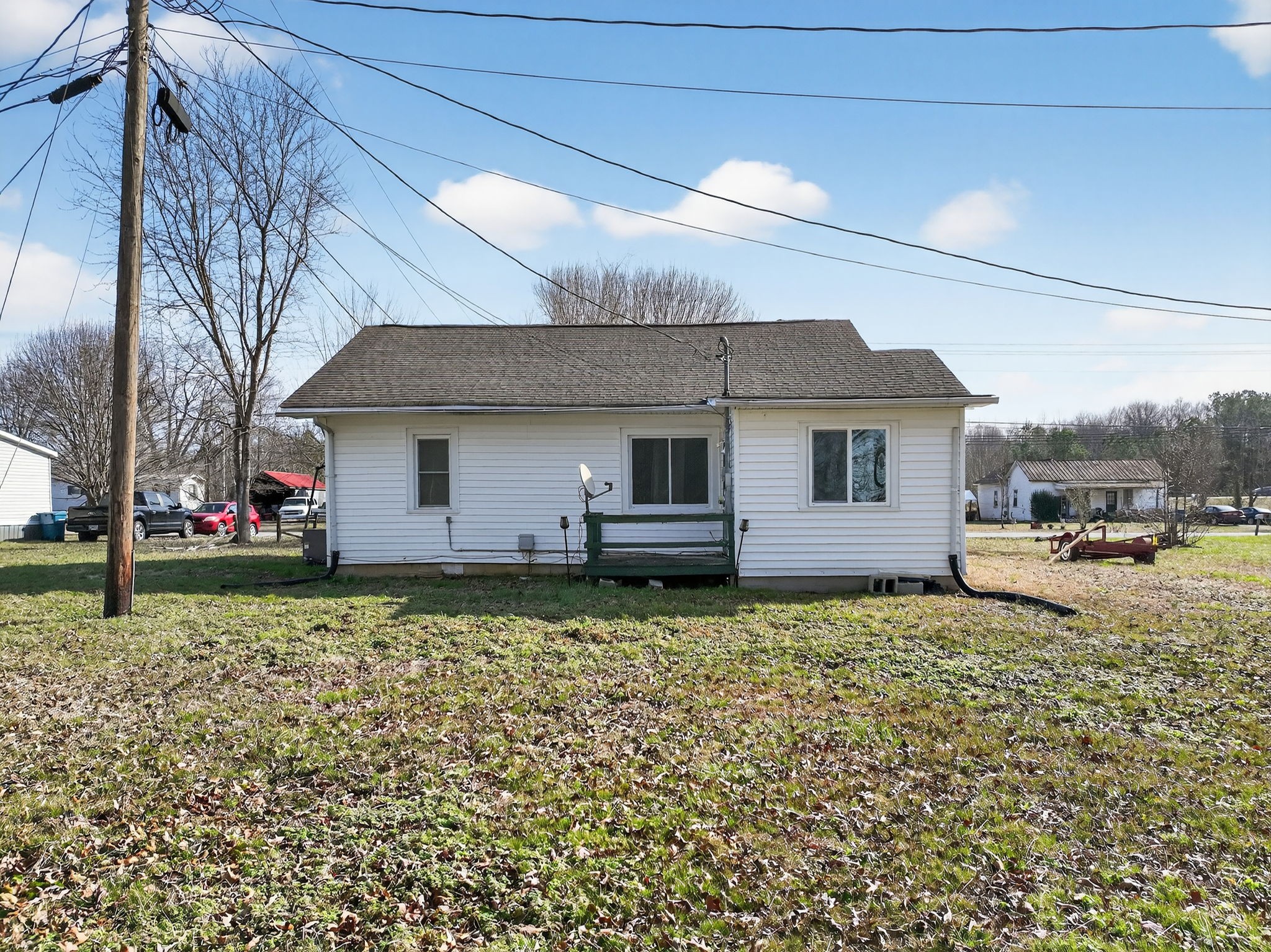 1360 Dunavin Drive Baxter, TN 38544 - Photo 21 of 24 a view of a house with a yard