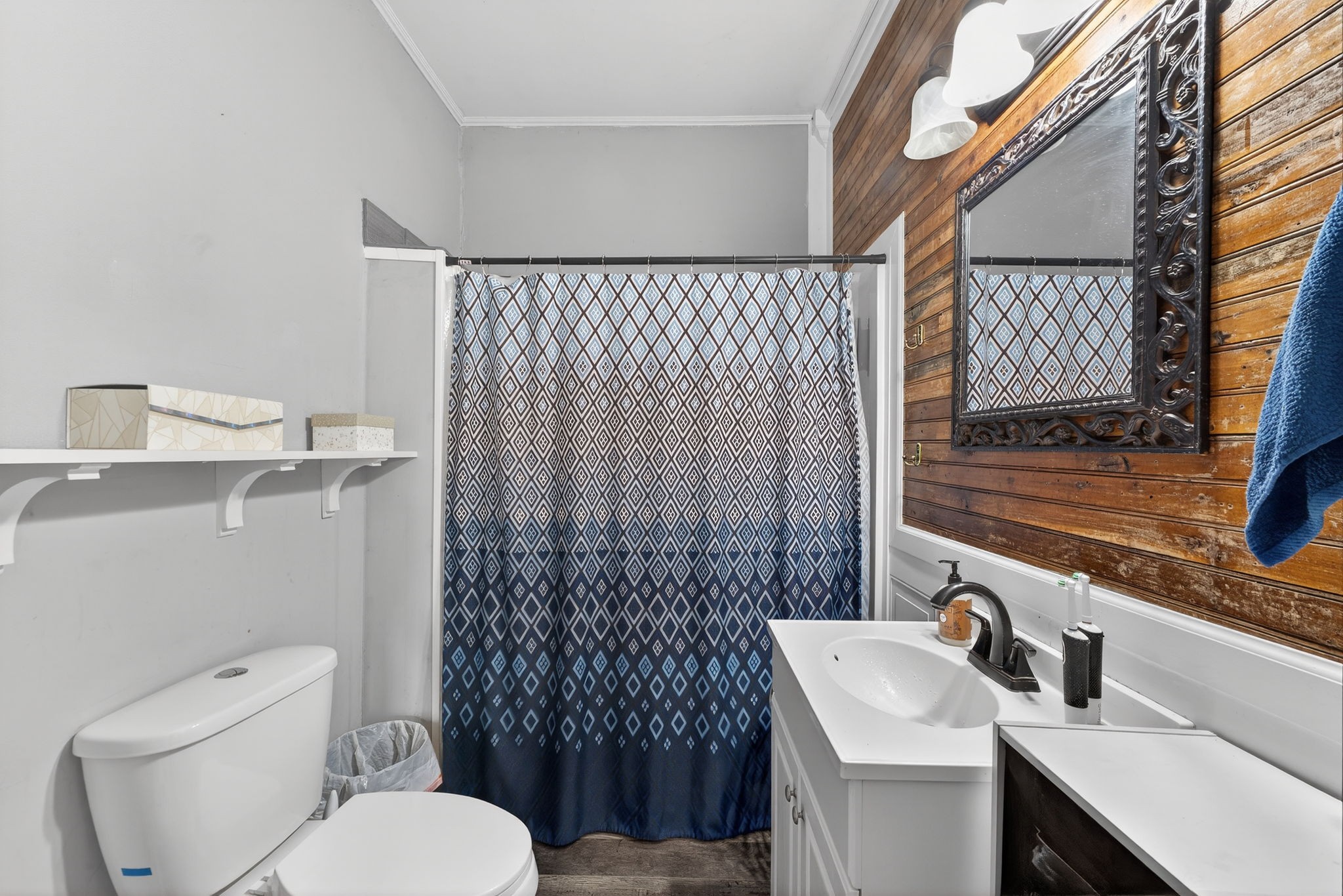 1360 Dunavin Drive Baxter, TN 38544 - Photo 6 of 24 a bathroom with a sink a toilet and a mirror