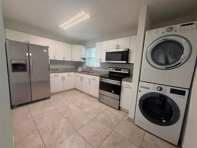 en empty room with windows