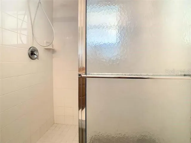 an outdoor space with furniture and garden