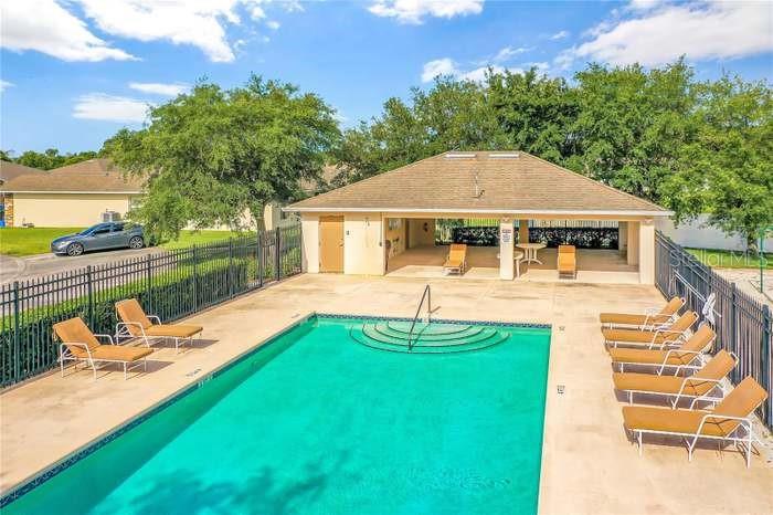 2685 Shelby Ruth Place St. Cloud, FL 34769 - Photo 14 of 16 an outdoor space with furniture and garden