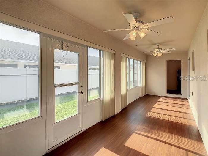 2685 Shelby Ruth Place St. Cloud, FL 34769 - Photo 10 of 16 a view of an empty room with a window
