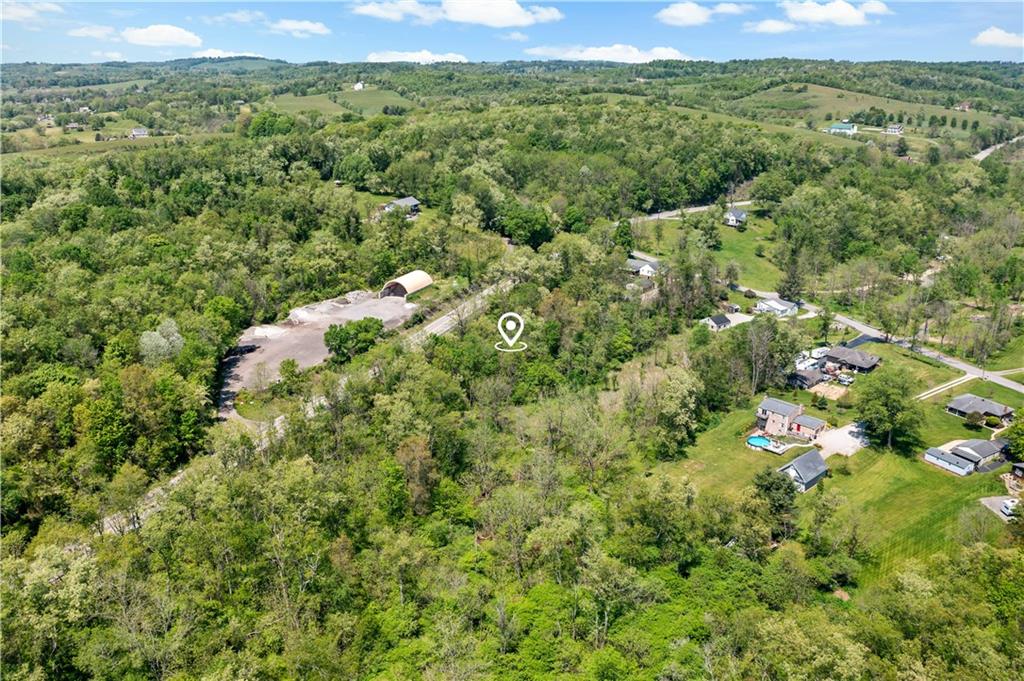 20 Coleman Road McDonald, PA 15057 - Photo 33 of 39 a view of a lush green forest with trees and houses