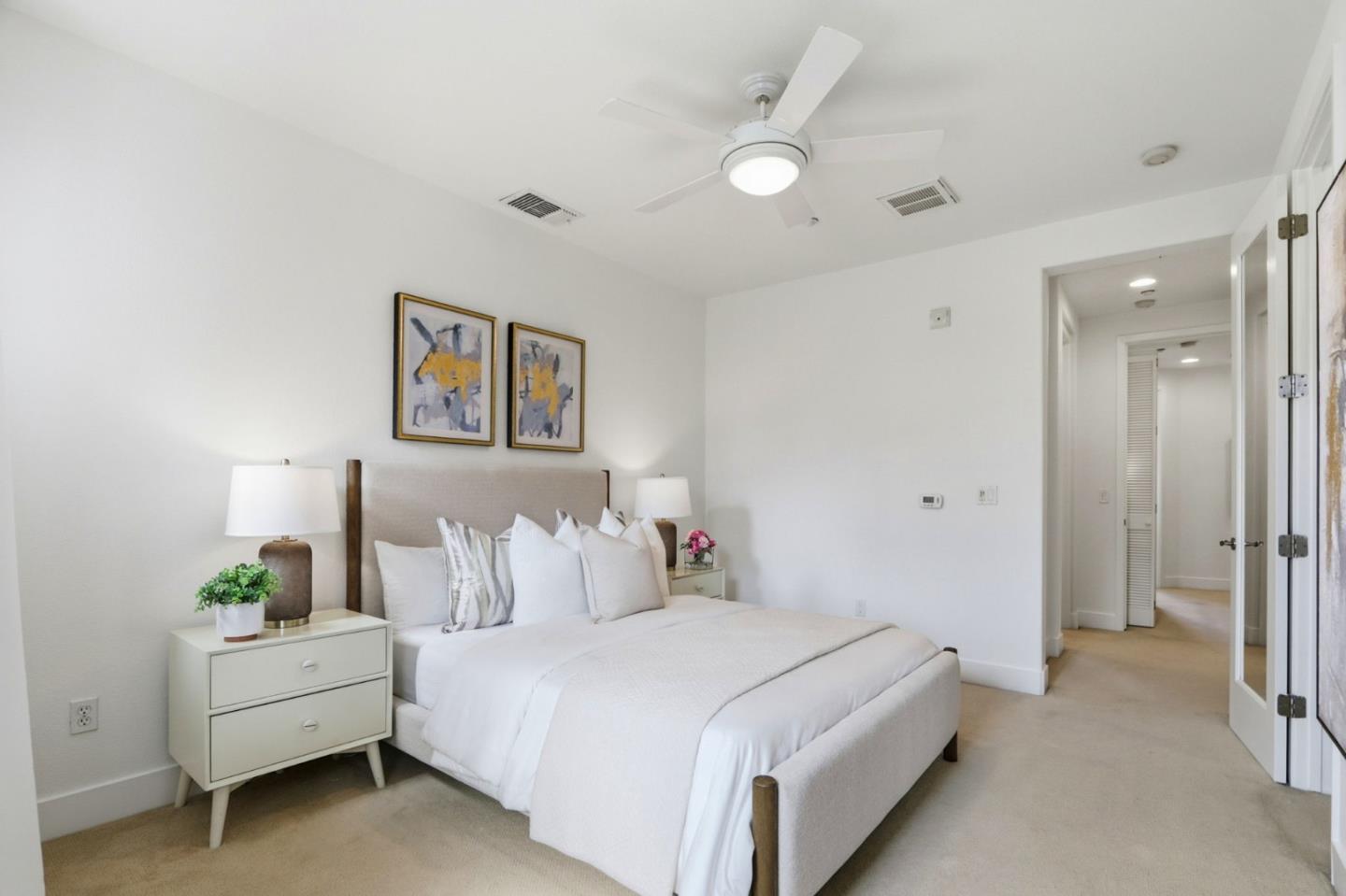 4206 Rickeys Way, Unit C Palo Alto, CA 94306 - Photo 19 of 44 a bedroom with a bed and a painting on the wall