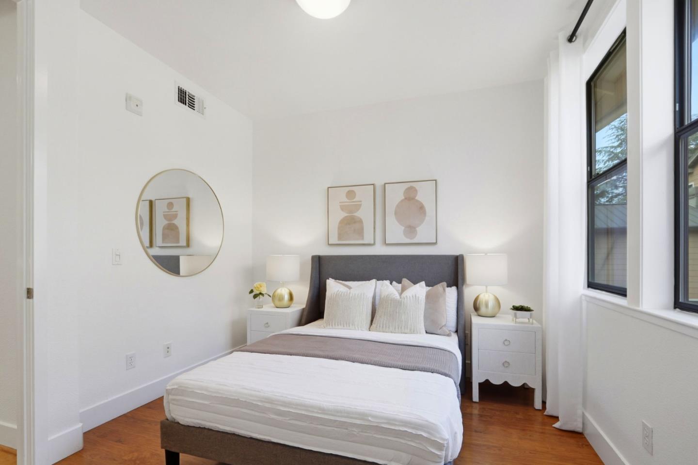 4206 Rickeys Way, Unit C Palo Alto, CA 94306 - Photo 24 of 44 a bedroom with a bed and a painting on the wall