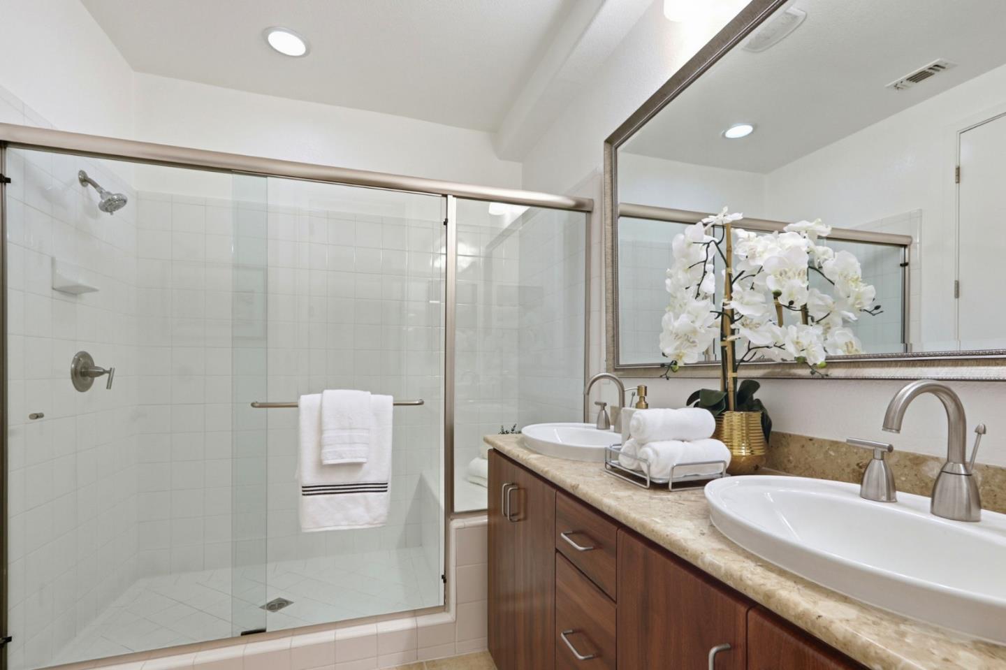 4206 Rickeys Way, Unit C Palo Alto, CA 94306 - Photo 30 of 44 a bathroom with double vanity sinks and a shower